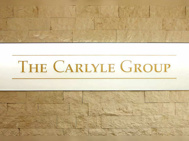 FILE PHOTO: The logo of The Carlyle Group is displayed at the company's office in Tokyo
