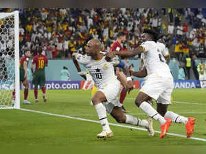 Ghana's Andre Ayew, left, celebrates with Ghana's Mohammed Kudus after scoring h...