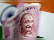Rupee gains 8 paise to 81.60 against US dollar