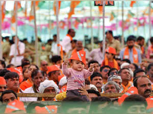 **EDS: TWITTER IMAGE VIA @BJP4Gujarat** Bhavnagar: A young supporter during Prim...