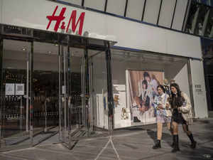 UPDATE 3-Fashion retailer H&M to cut 1,500 jobs in cost-saving drive