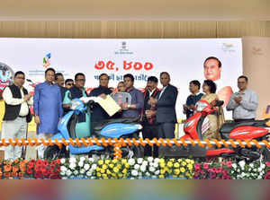 Guwahati: Assam Chief Minister Himanta Biswa Sarma distributes scooties to 35,800 meritorious girls and boys students who securing 75% and above in higher Secondary examination 2022 during the 'Dr Banikanta Kakati Merit Award' under the 'Pragyan Bharati Scheme' of the State government, at Khanapara in Guwahati, Wednesday, November 30, 2022. (Photo: Twitter)