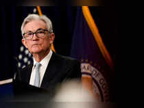 Fed's Powell: Rate hikes to slow, but adjustment just beginning