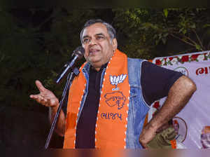 Surat: Bollywood actor and former BJP MP Paresh Rawal addresses an election camp...