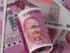 Rupee's weekly advance pales against peers; premiums fall more