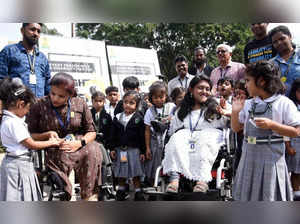 Bengaluru:Specially-abled women in the wheelchair at the International day of persons with Disabilities a full day interactive awareness drive at Lalbagh, in Bengaluru on Friday 2nd December 2022.(PHOTO:IANS)