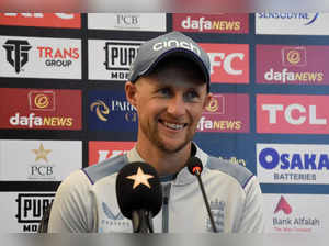 England's former cricket captain Joe Root, addresses a news conference in Rawalpindi