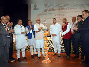 Patna, Nov 05 (ANI): Bihar Chief Minister Nitish Kumar lights a lamp in presence...