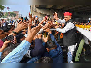 Mainpuri: Samajwadi Party President Akhilesh Yadav meets supporters during a pub...