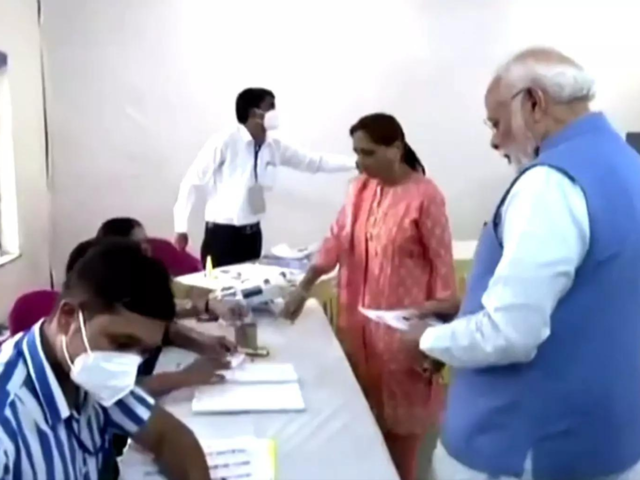 Modi arrives at polling station