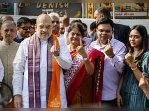 Ahmedabad: Union Home Minister Amit Shah, his wife Sonal Shah and son Jay Shah s...