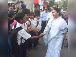 Hingalganj:West Bengal Chief Minister Mamata Banerjee meets students of Taki Girls School during her visits in Taki on Wednesday November 30,2022.(Photo:IANS)