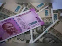 Rupee falls most in over 1 month, far forward premiums at multi-year lows
