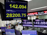 Japanese shares end higher as chip stocks, exporters gain