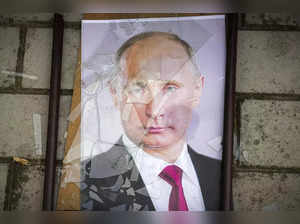 Kherson: A portrait of Russian President Vladimir Putin lies on the ground near ...