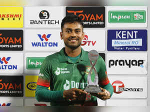 Dhaka: Bangladesh's Mehidy Hasan Miraz, poses with the man of the match trophy a...