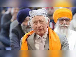 Take a look at King Charles III's Luton gurudwara visit, see images as the British royal sits on floor, covers head, and offers prayers