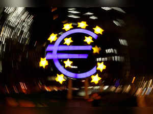 FILE PHOTO: The euro sign is photographed in front of the former head quarter of the European Central Bank in Frankfurt