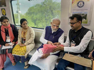 **EDS: IMAGE VIA @PMOIndia** Nagpur: Prime Minister Narendra Modi takes Metro ri...
