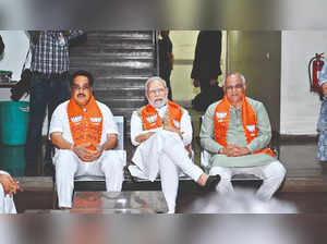 PM with Gujarat BJP president C R Paatil and CM Bhupendra Patel