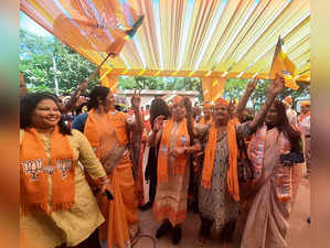 Gandhinagar, Dec 08 (ANI): Bharatiya Janata Party (BJP) Mahila Morcha supporters...