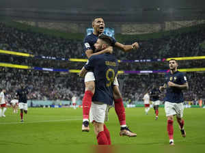 Doha: France's Olivier Giroud celebrates with France's Kylian Mbappe, after scor...