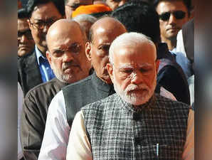 New Delhi: Prime Minister Narendra Modi, Defence Minister Rajnath Singh, Union Home Minister Amit Shah during a tribute ceremony to pay homage to martyrs who lost their lives in the 2001 Parliament attack on its 21st anniversary, at Parliament House, in New Delhi on Tuesday, December 13, 2022. (Photo:Qamar Sibtain/ IANS)