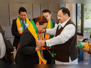 New Delhi: BJP President J P Nadda greets Meghalaya MLA Ferlin CA Sangma after s...