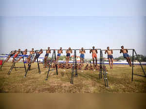 Patna: Aspirants undergo a physical test during an Agniveer army recruitment ral...