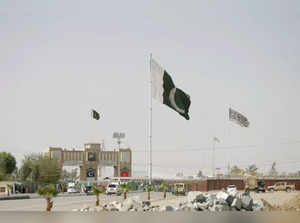 General view of Pakistan and Taliban flags at the Friendship Gate crossing point in the Pakistan-Afghanistan border town of Chaman