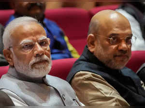 New Delhi: Prime Minister Narendra Modi with Home Minister Amit Shah during the ...
