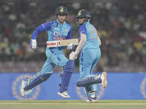 Mumbai: Indian players Shafali Verma and Smriti Mandhana run between the wicket ...