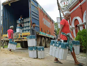 Workers are transporting the (VVPAT) Voter Verifiable Paper Audit Trail  machine, Reached today at Agartala from Hyderabad ECIL (Electronics Corporation of India Limited ), to the warehouse in front of government officials and people from election commision, for upcoming Assembly Election in Tripura, at Agartala on Monday, October 03,2022. (Photo:Abhishek Saha/IANS)