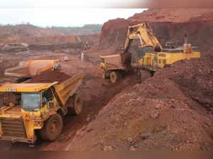 Panaji: A veiw of iron ore mining at Kodli near Panaji on May 28, 2016. Mining of iron ore and bauxite, a multi-billion dollar industry in Goa and one of the main stays of the state economy was halted in 2012 following a series of bans first by the state government, central government and then by the Supreme Court of India, following the expose of a Rs.35,000 crore illegal mining scam in which all major mining companies, politicians and bureaucrats were linked. (Photo: IANS)