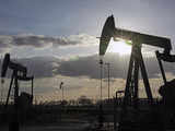 Oil rises on tight U.S. stocks as winter blast hits