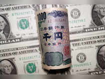 Dollar edges higher as U.S. data lends support; yen holds gains