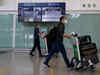 China plans to cut quarantine for travelers from next month