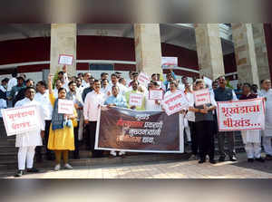 Nagpur: Shiv Sena (Uddhav Thackeray), Congress and NCP MLAs take part in a demonstration against Maharashtra Government outside the Vidhan Bhawan during the winter session of Maharashtra, in Nagpur on Dec 21, 2022. (Photo: Chandrakant Paddhane/IANS)