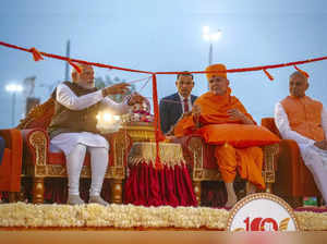 Ahmedabad: Prime Minister Narendra Modi and Mahant Swami Maharaj of BAPS Swamina...