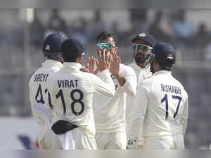 India's Axar Patel celebrates wicket of Bangladesh's Mehidy Hasan Miraz during t...