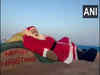 Noted sand artist creates giant Santa Claus sculpture at Odisha beach