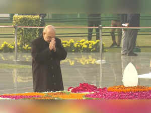Amit Shah pays tribute to Atal Bihari Vajpayee and Pt Madan Mohan Malviya.