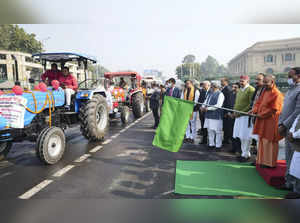Lucknow: Uttar Pradesh Chief Minister Yogi Adityanath flags off a tractors rally...