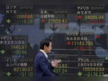 Japanese shares end higher on Wall Street gains, financials weigh