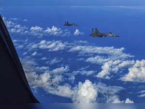 FILE - In this photo released by Xinhua News Agency, fighter jets of the Eastern...