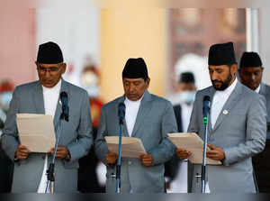 Newly elected Prime Minister Pushpa Kamal Dahal administers the oath of office at the presidential building in Kathmandu
