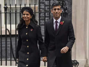 Britain's Prime Minister Rishi Sunak and his wife Akshata Murty leave 10 Downing...