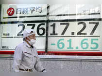 Asian shares skid as COVID surge in China unsettles investors