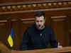 Zelenskiy, Putin promise victory in contrasting New Year speeches