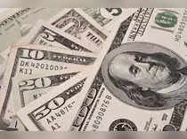 Dollar edges up at start of new year but sentiment frail